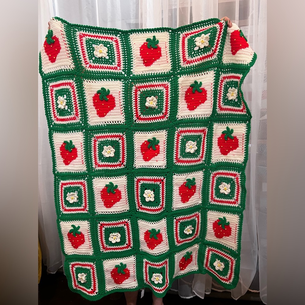 Strawberry 3-D accented crocheted blanket
